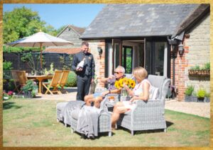 ecv nathan serving guests in garden2