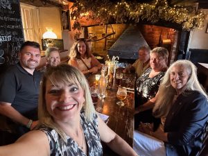 photo of Laura and Nathan with happy guests for gallery in June 2025 Newsletter – Week 2