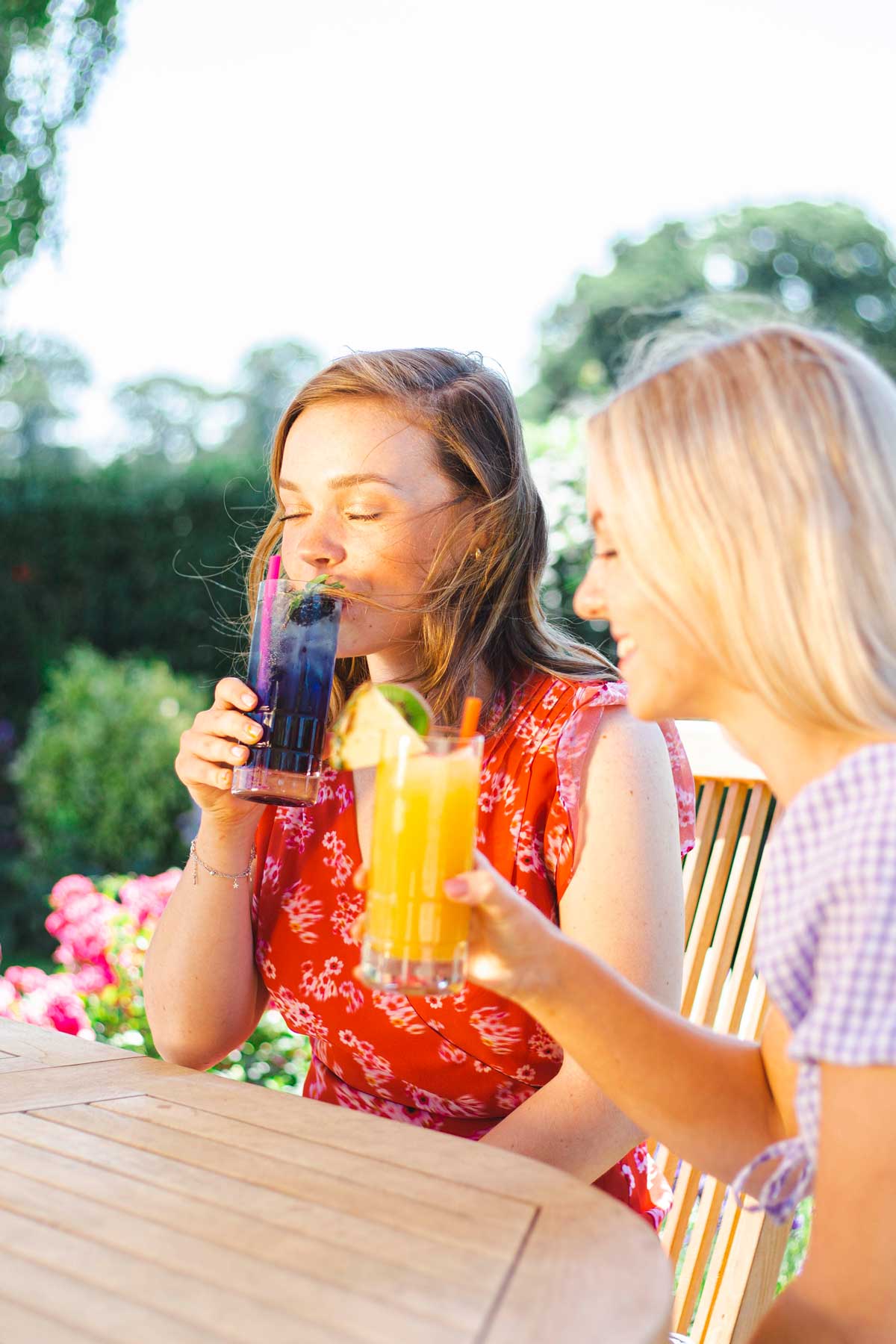 guests sipping on brightly coloured cocktails