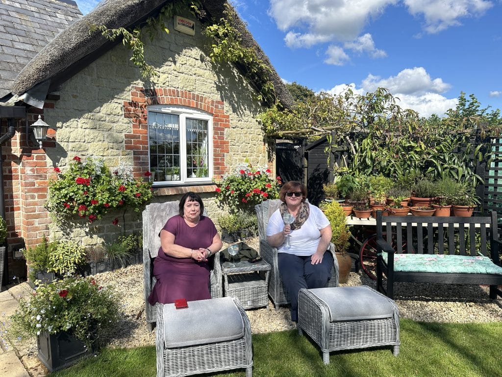 photo 2 of guests relaxing in the garden photo 2 of guests relaxing in the garden