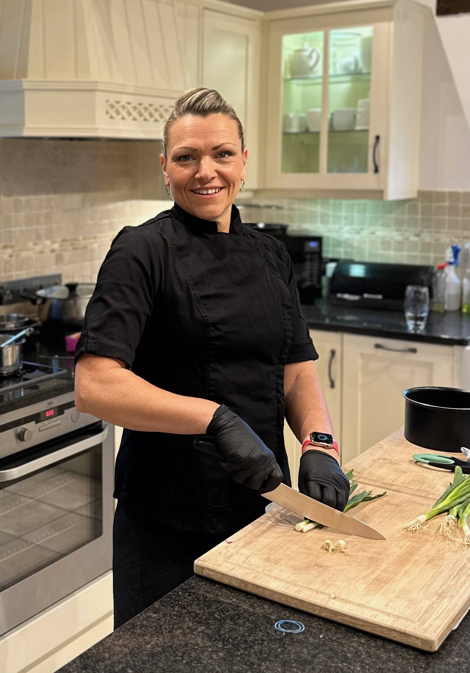 Laura preparing food in her kitchen Photo of Laura preparing food in her kitchen
