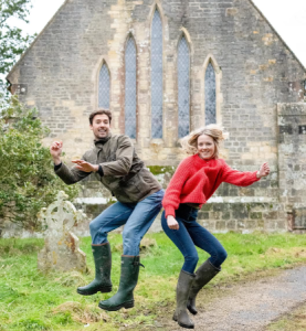 photo of Tash and Jon Wedge in front of their church renovation project photo of Tash and Jon Wedge in front of their church renovation project