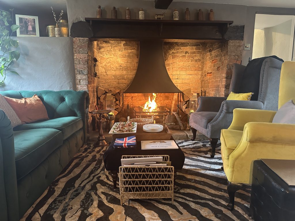 photo of a blazing fireplace in The Snug at Well Cottage photo of a blazing fireplace in The Snug at Well Cottage